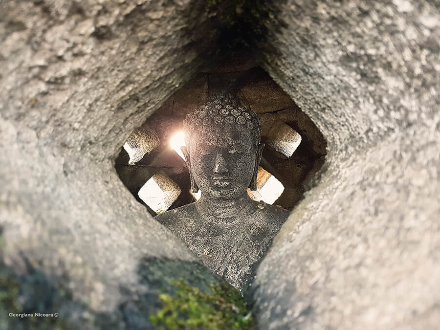buddha statue at borobudur temple compounds