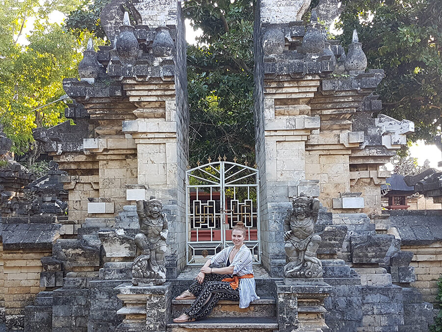 girl sitting on rocky steps